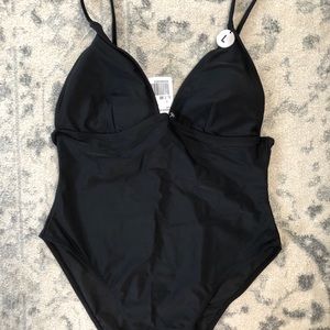 Black one piece bathing suit.